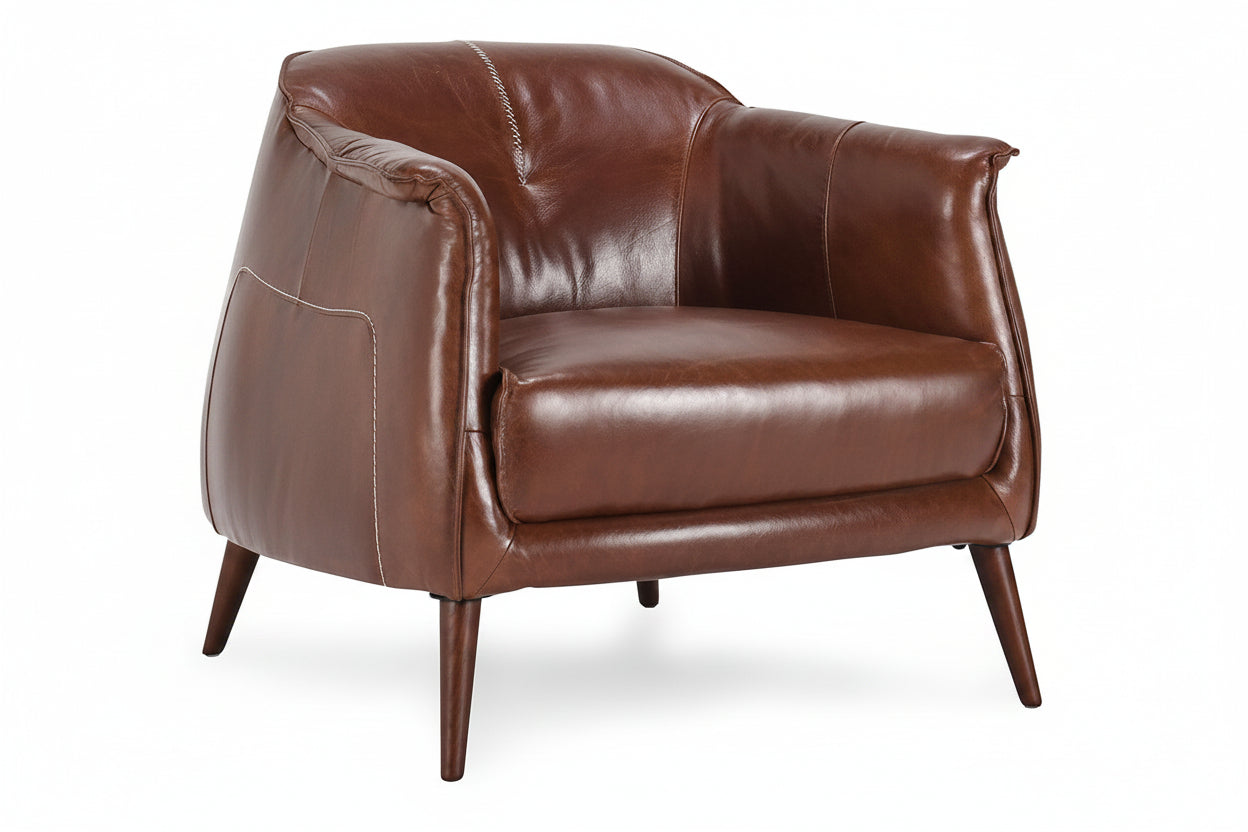 Brown leather armchair on a white background