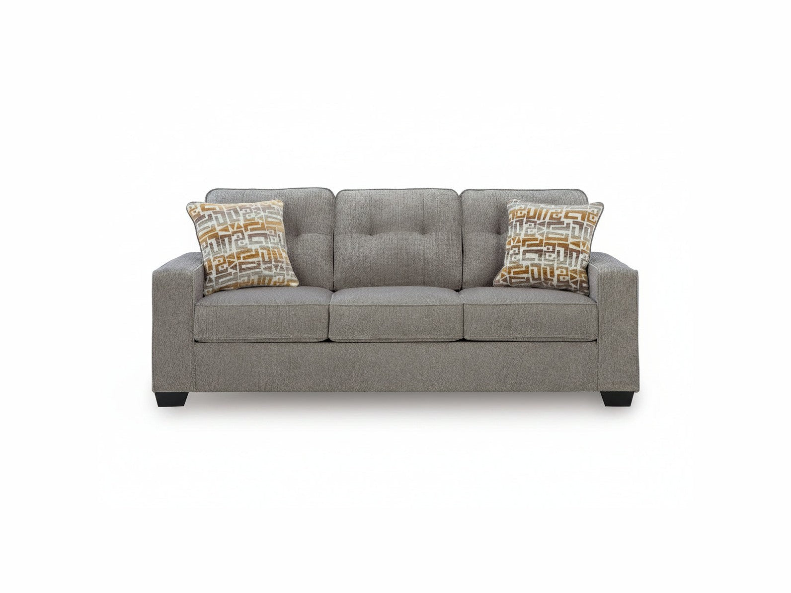 Gray sofa with patterned cushions on a white background