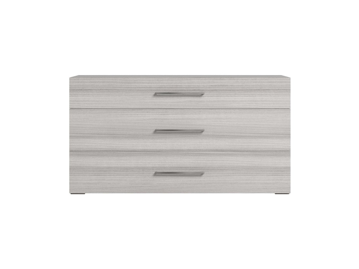 A three-drawer dresser with a light gray wood grain finish and slim horizontal metal handles, shown against a plain white background.