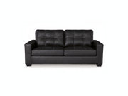 Black leather sofa on a white background