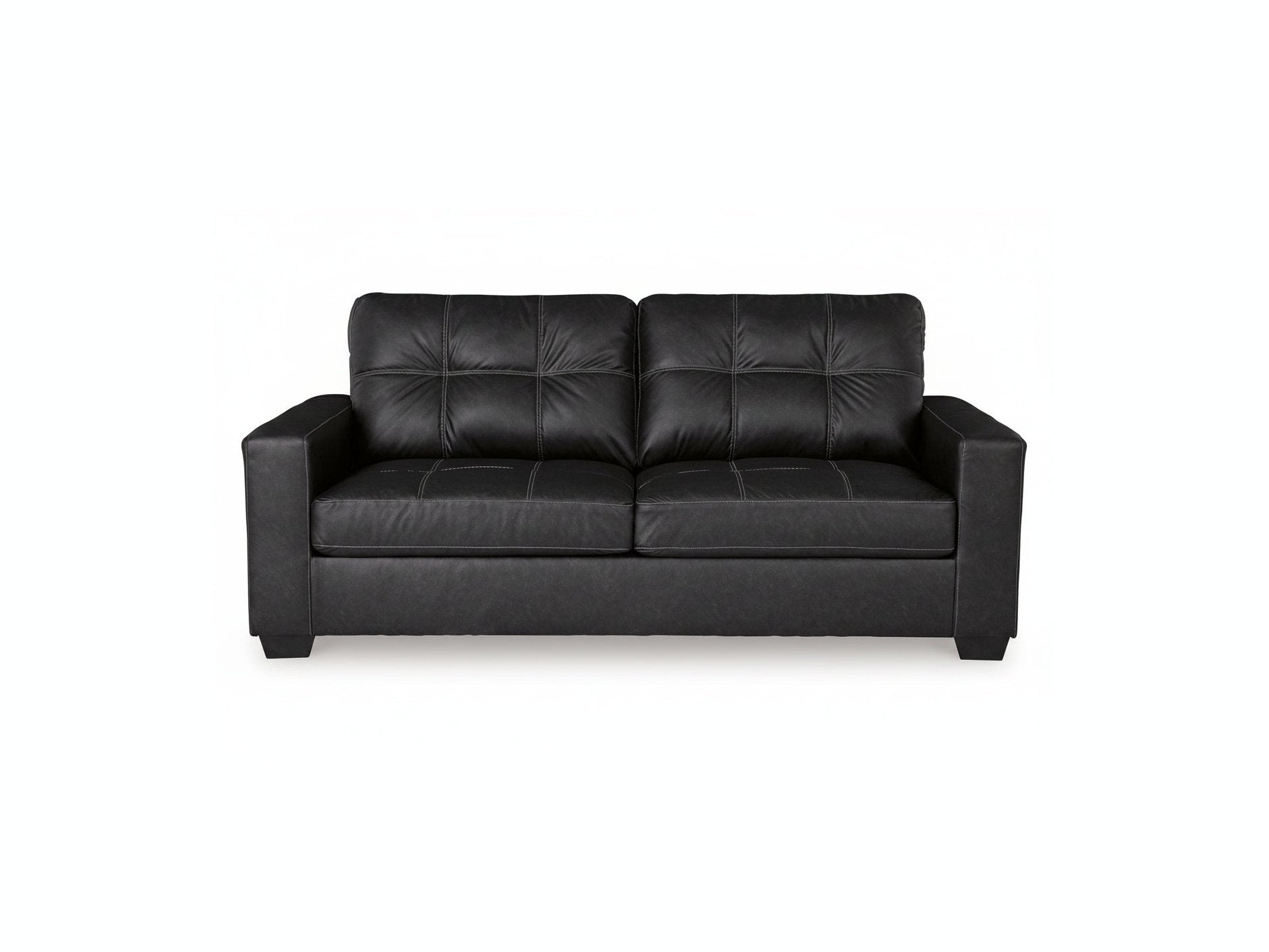 Black leather sofa on a white background