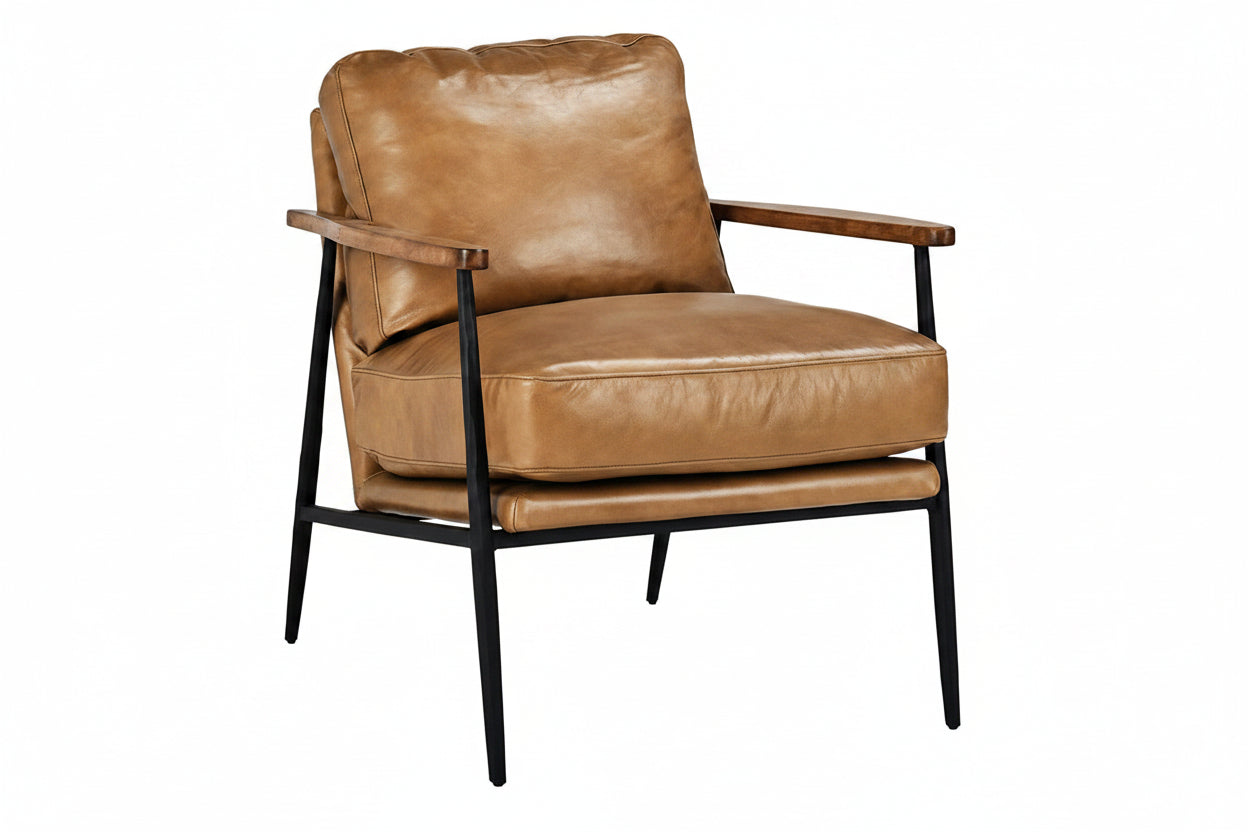Brown leather armchair with black metal legs on a white background