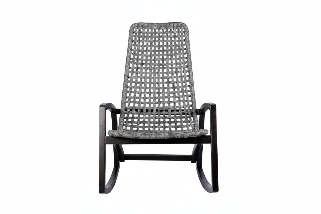 Rattan rocking chair with black frame on a white background