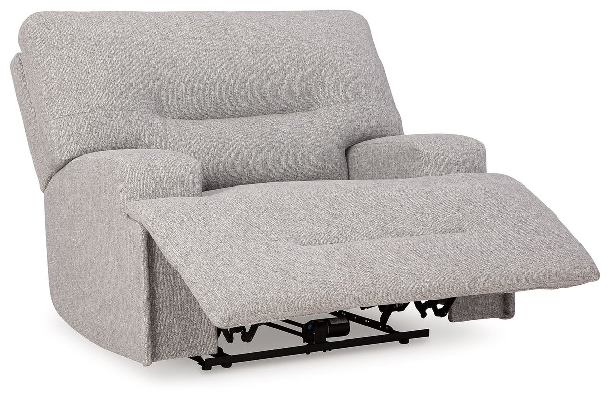 Gray recliner sofa with extended footrest on a white background