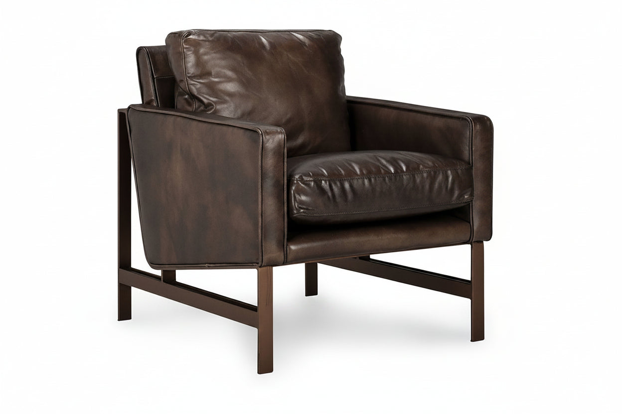 Brown leather armchair on a white background