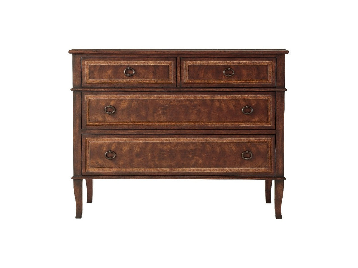 Wooden dresser with four drawers on a white background
