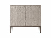 Cabinet with wavy patterned doors on a white background