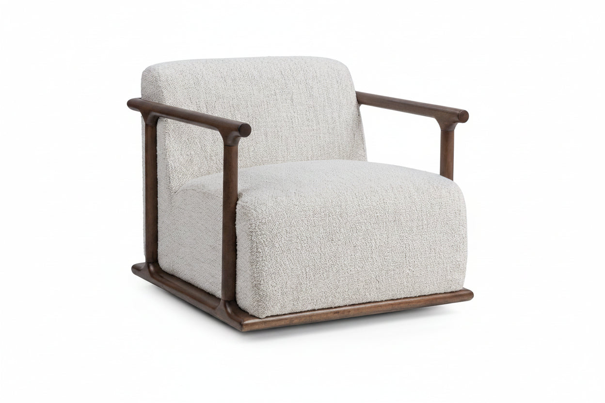White upholstered armchair with brown wooden frame on a white background