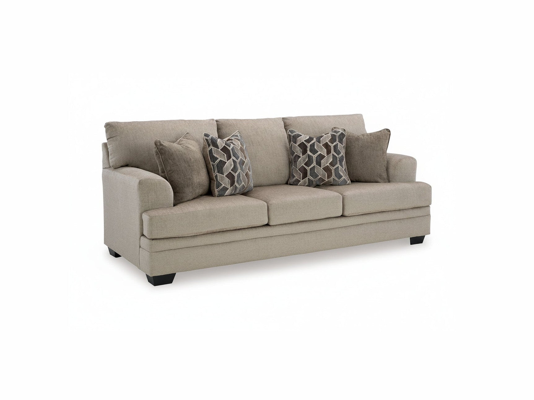 Beige sofa with patterned cushions on a white background