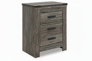 Wooden nightstand with three drawers on a white background