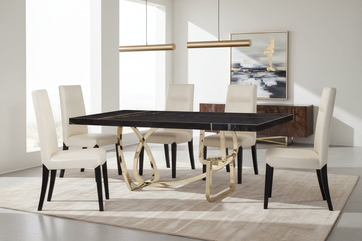 Tangle dining table with a unique base design and white chairs on a dark background.