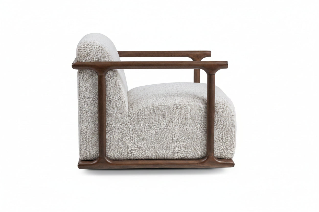 Modern armchair with wooden frame and gray upholstery on a white background