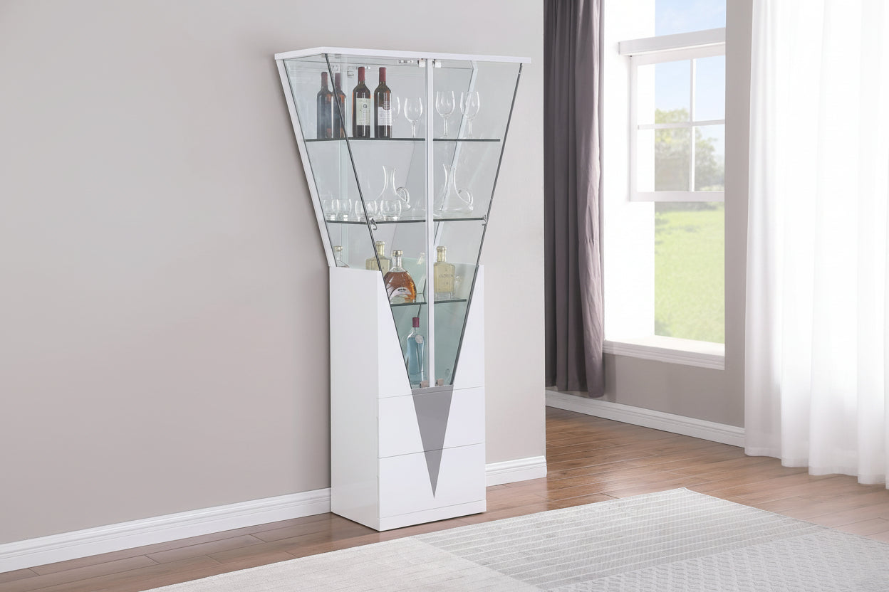 Tall white 6625 Curio with glass shelves in a room with a window and curtains.