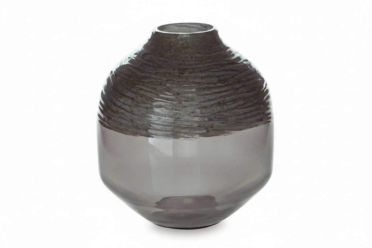 Smoky gray glass vase with ribbed texture on a white background