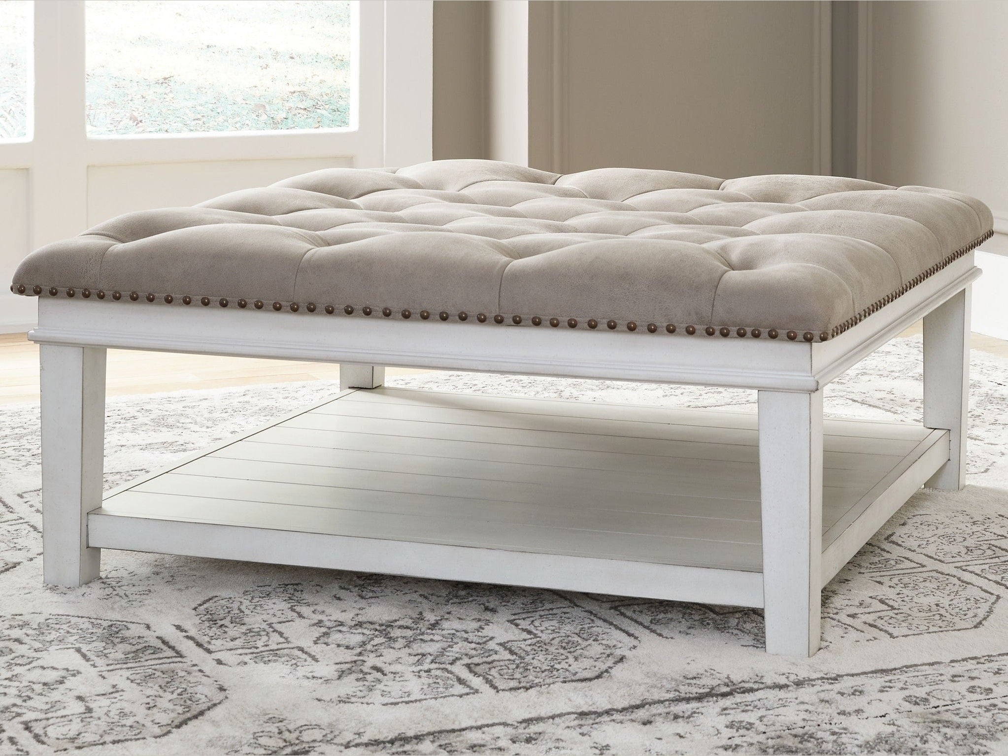 Kanwyn - Uph Ottoman Cocktail Table - Whitewash
