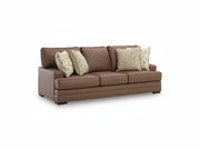 Villacourt brown sofa with decorative pillows on a white background.