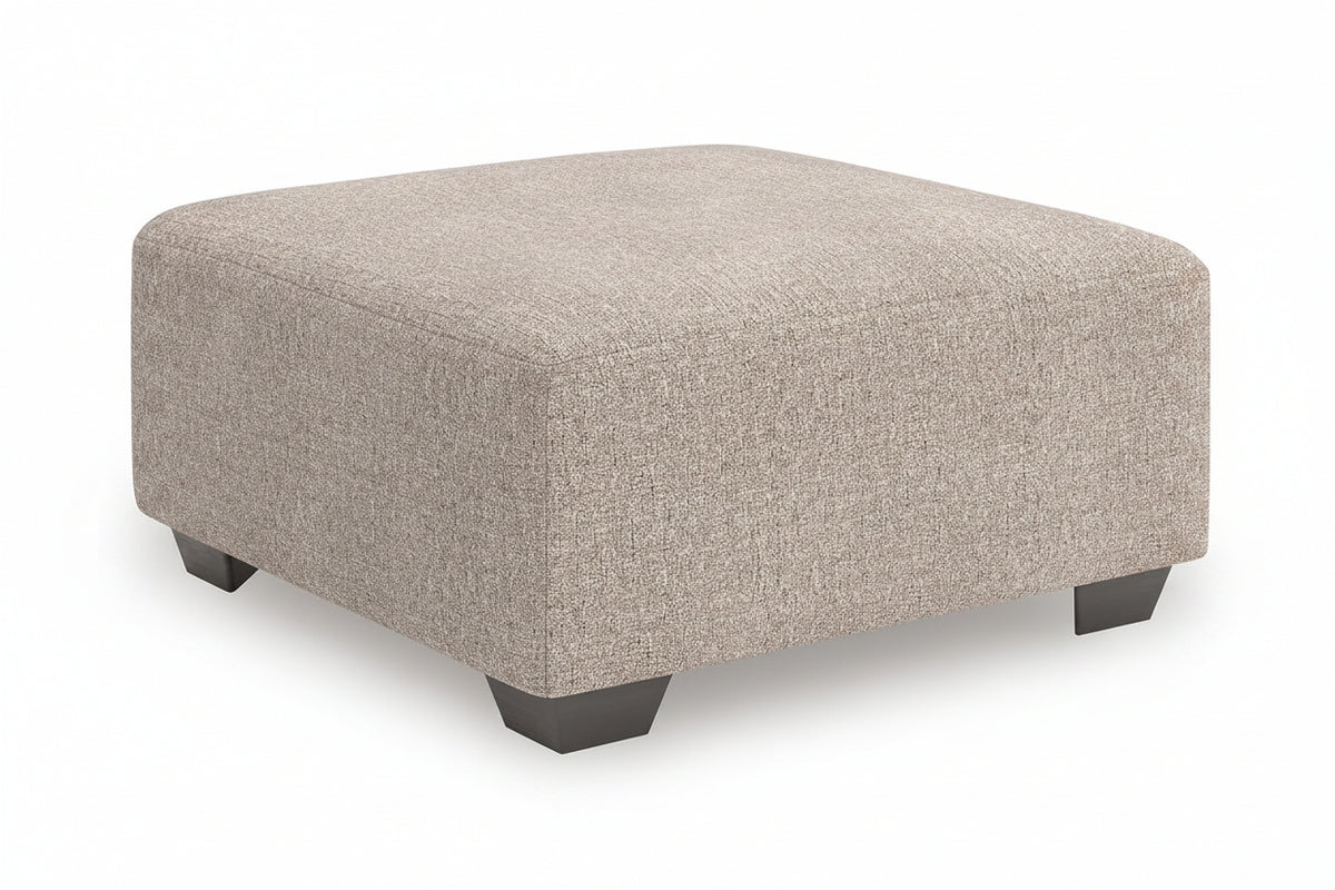 Beige textured ottoman on a white background