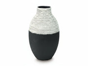 Girtha decorative vase with black and white striped design on a white background