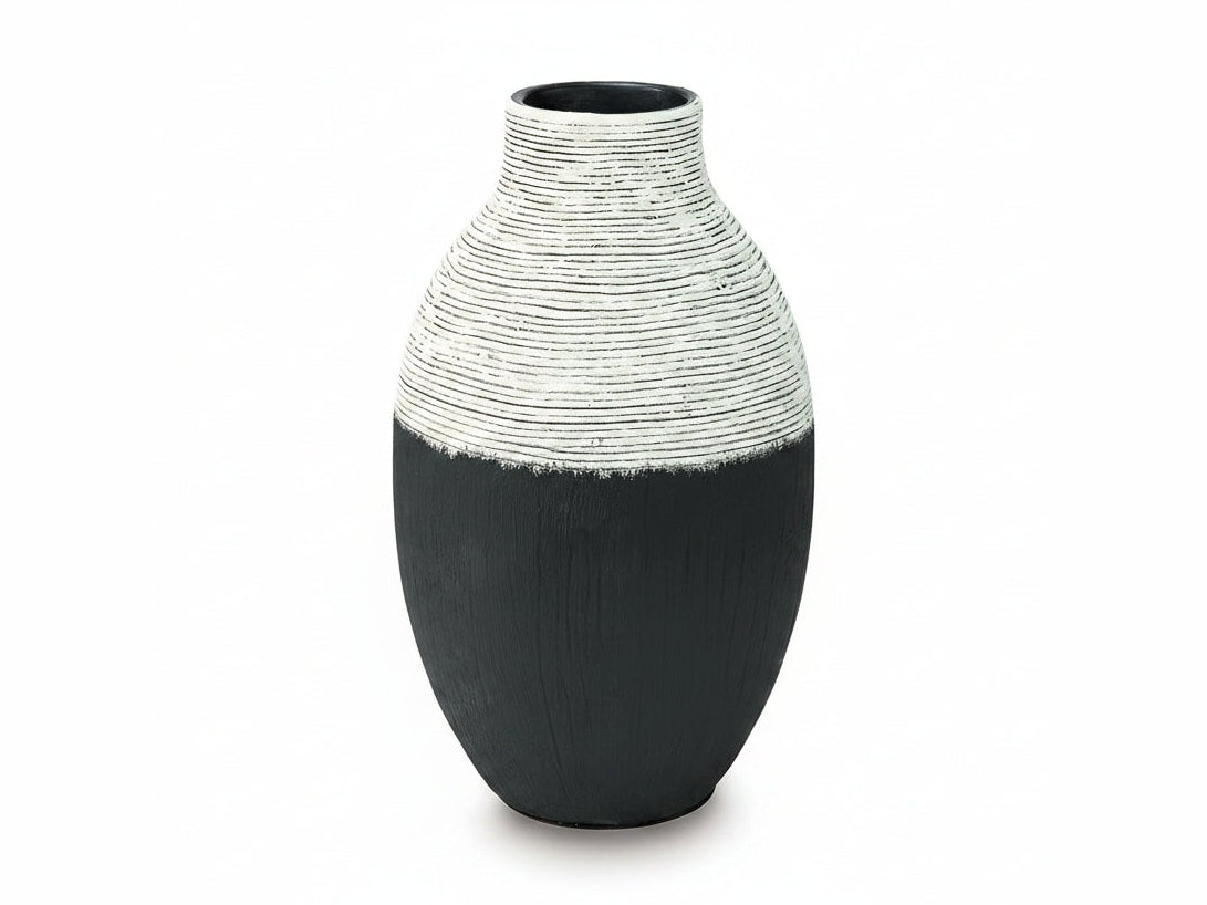Girtha decorative vase with black and white striped design on a white background