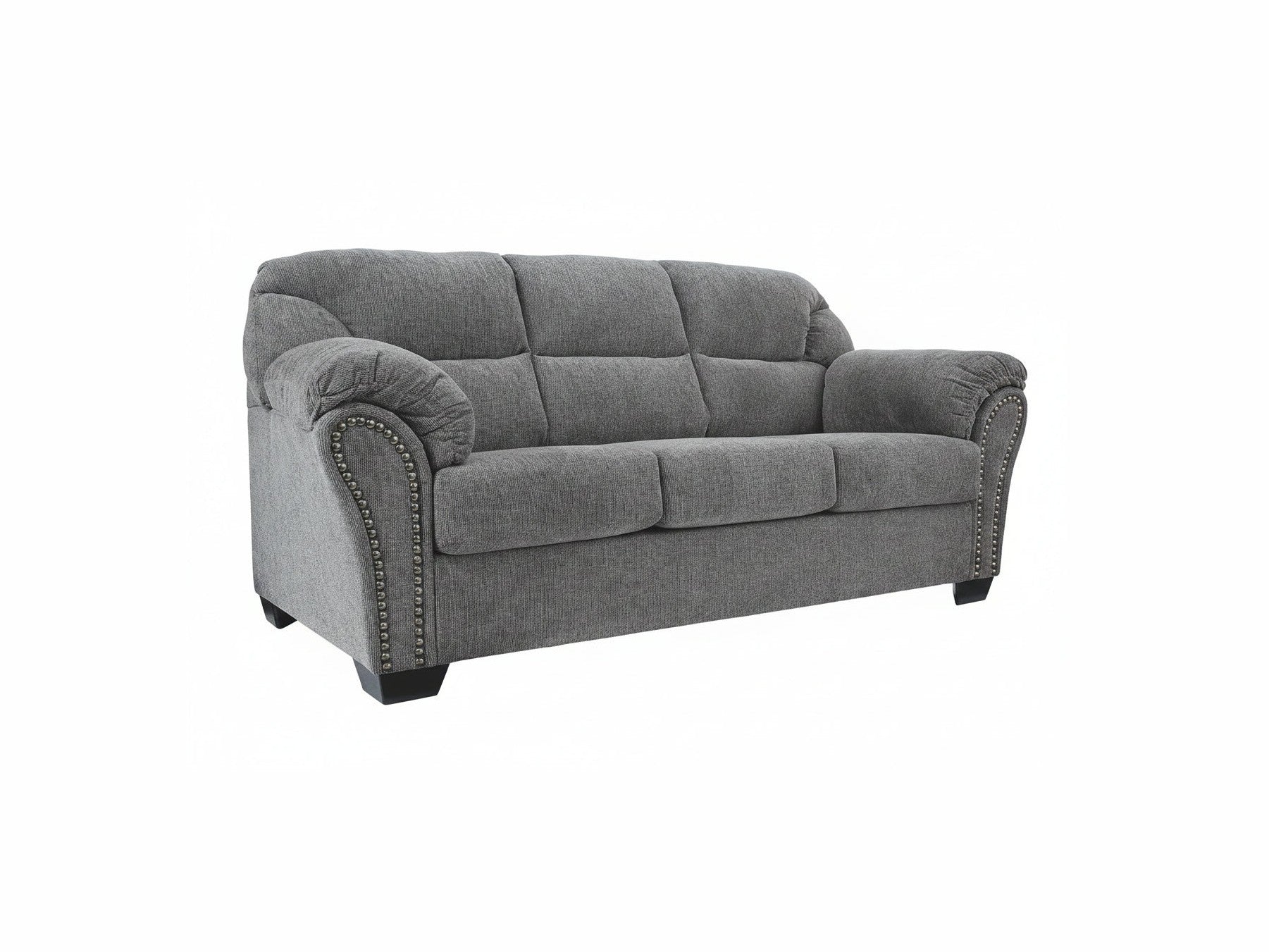 Gray sofa with nailhead trim on a white background