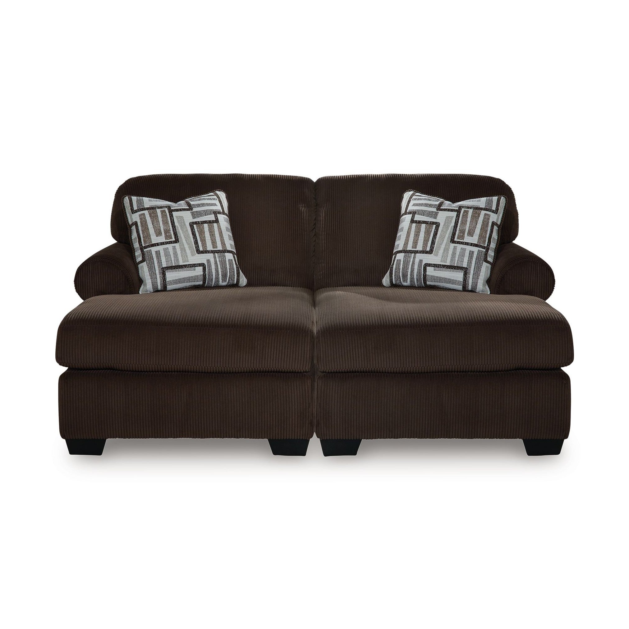 Brown sectional sofa with patterned cushions on a white background