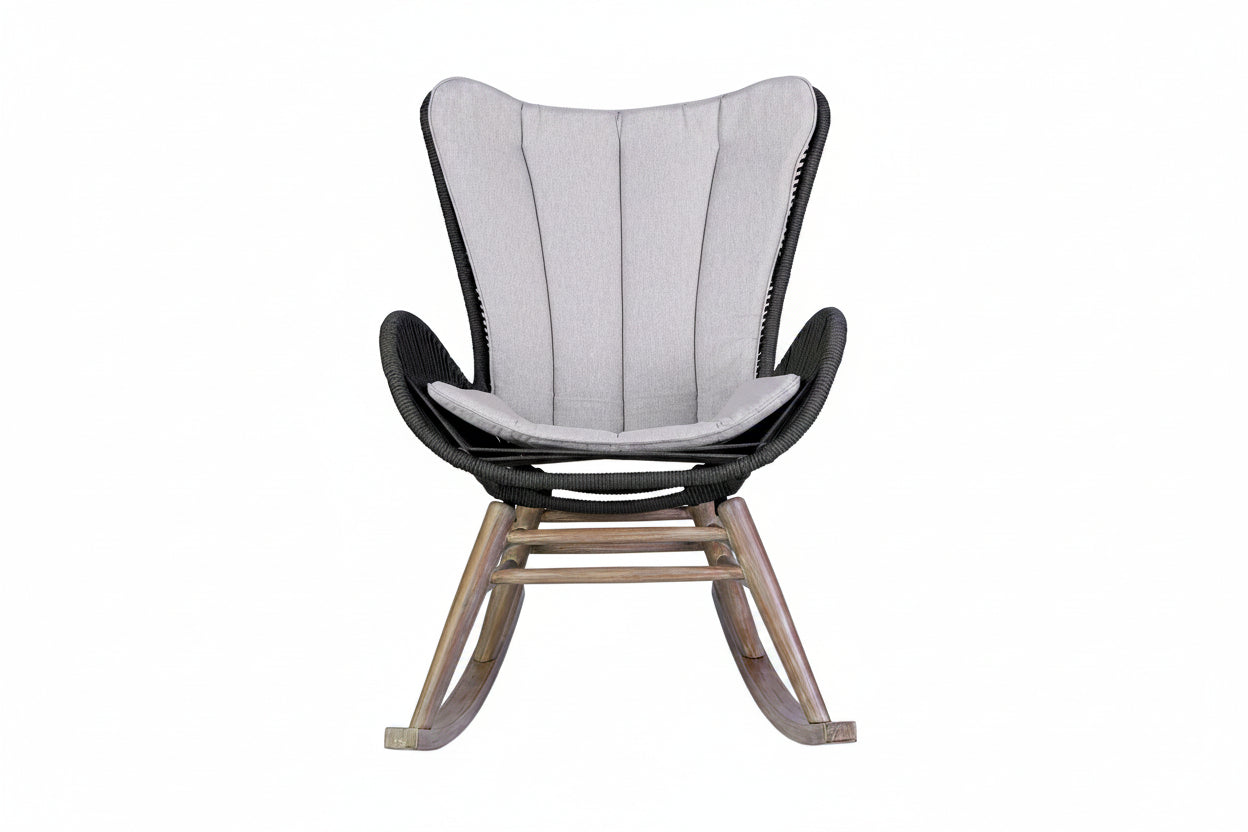 Rattan rocking chair with gray cushion on a white background