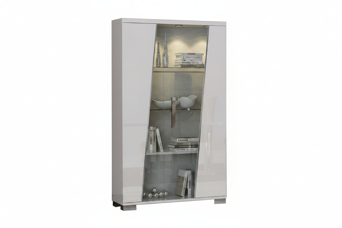 A tall, modern glass display cabinet with a glossy white finish, featuring two side doors and a central angled glass panel showing shelves with decorative items.
