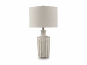 Imre table lamp with a textured glass base and beige lampshade on a white background