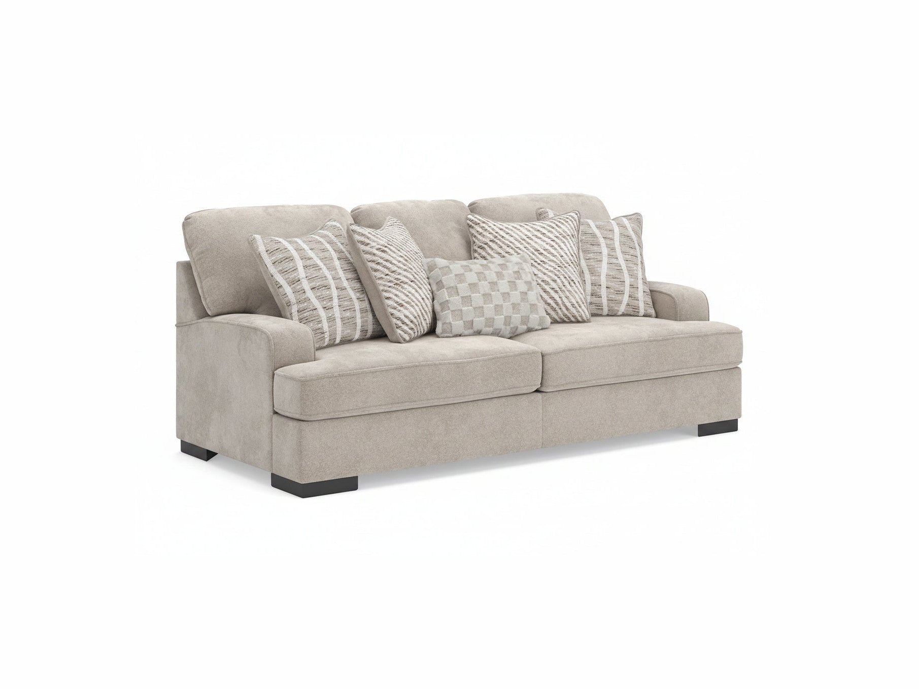 Beige sofa with patterned cushions on a white background