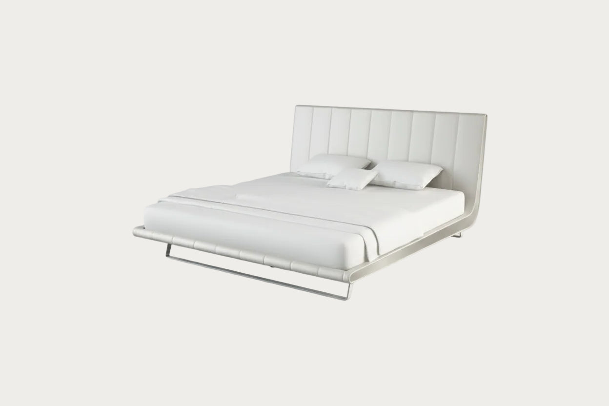 Zina white bed with tufted headboard on a white background