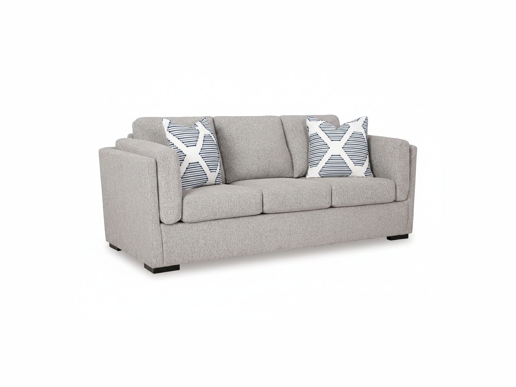 Gray sofa with striped blue and white cushions on a white background