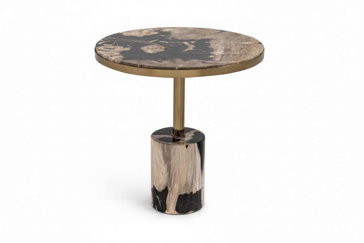 Round marble table with gold base on a white background