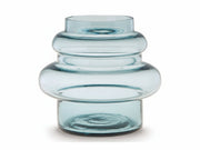 The Vallmen blue glass vase on a white background.
