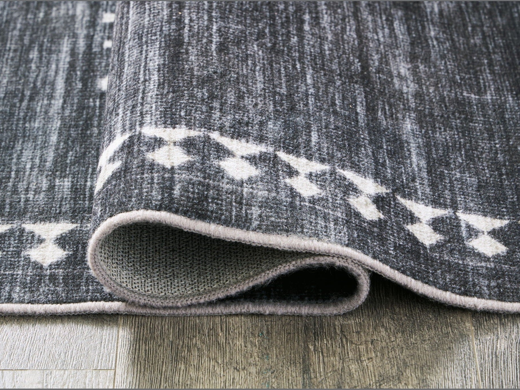 Arloman - Area Rug