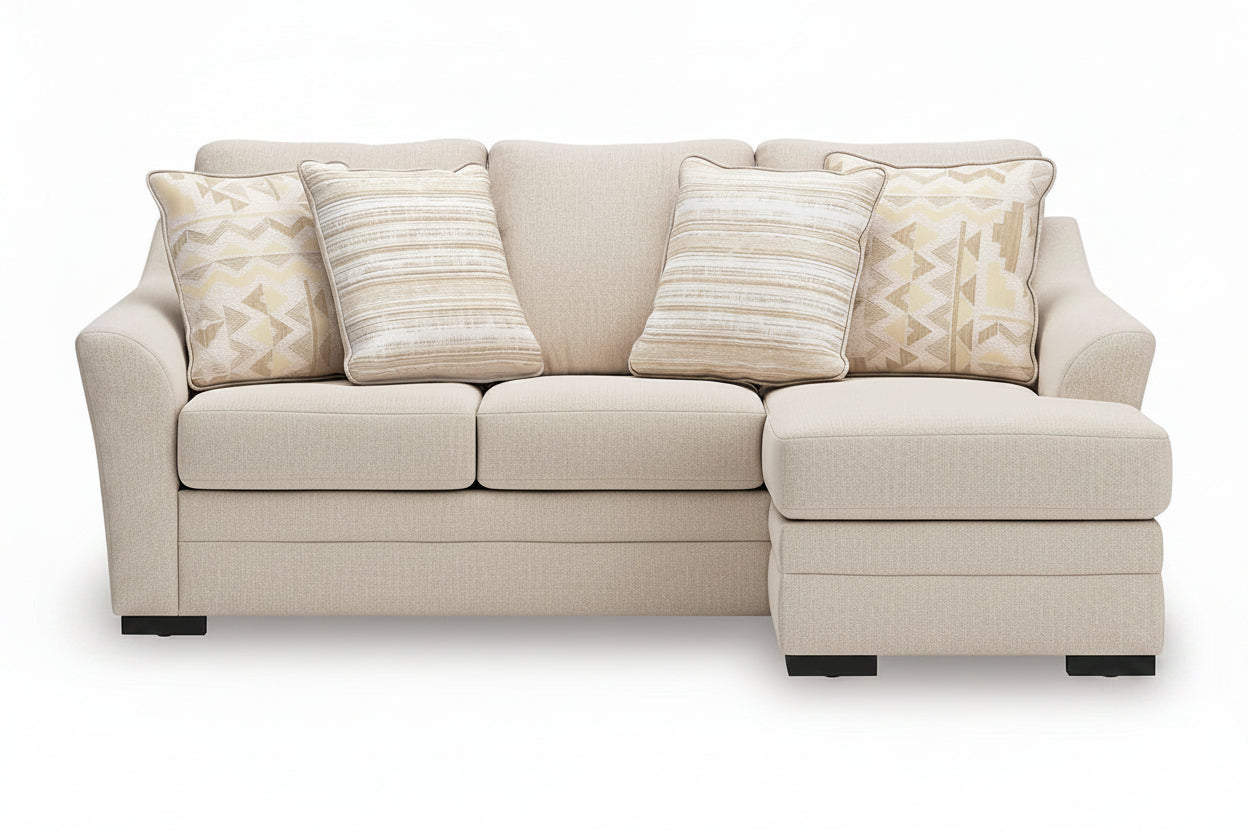 Lango beige sectional sofa with patterned cushions on a white background.