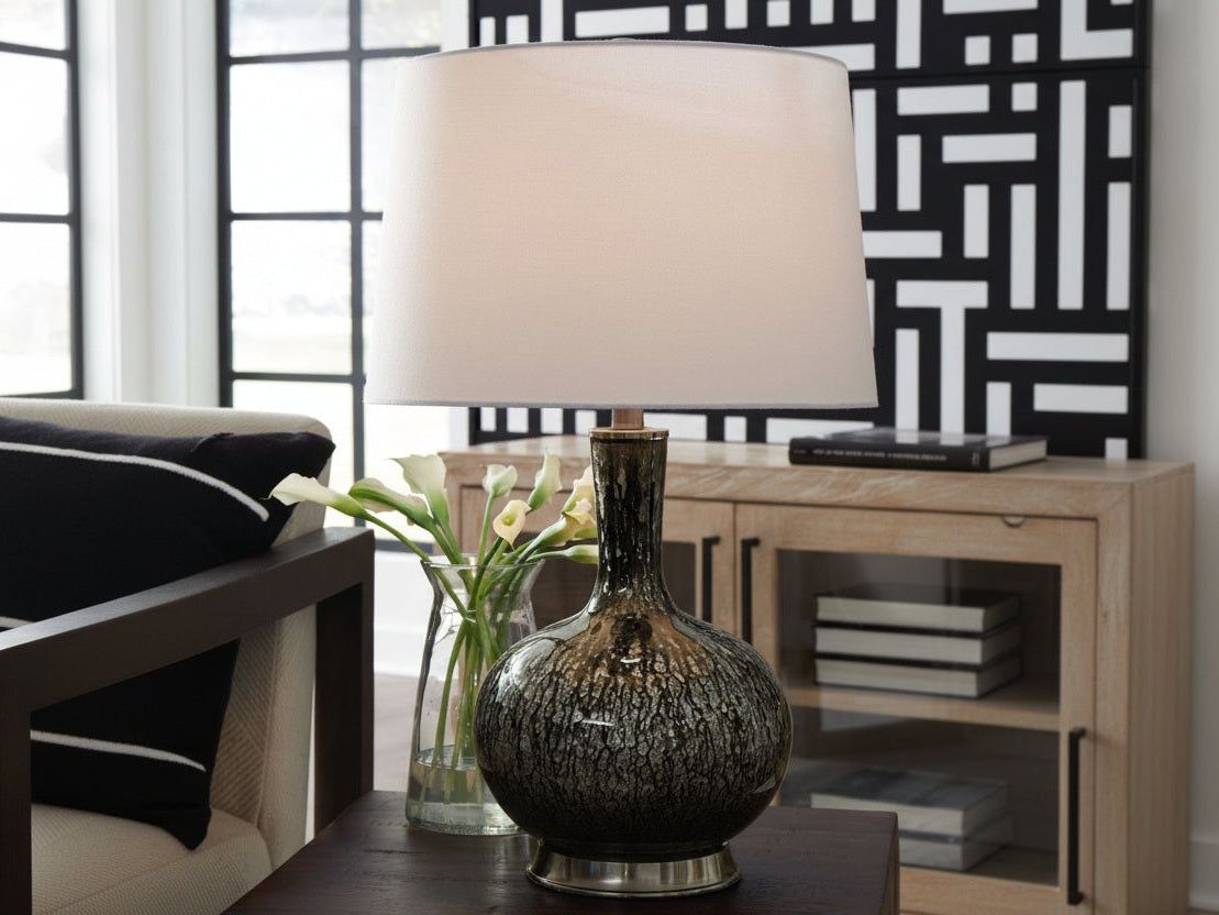 Tenslow decorative lamp with a vase of flowers on a table in a room setting.