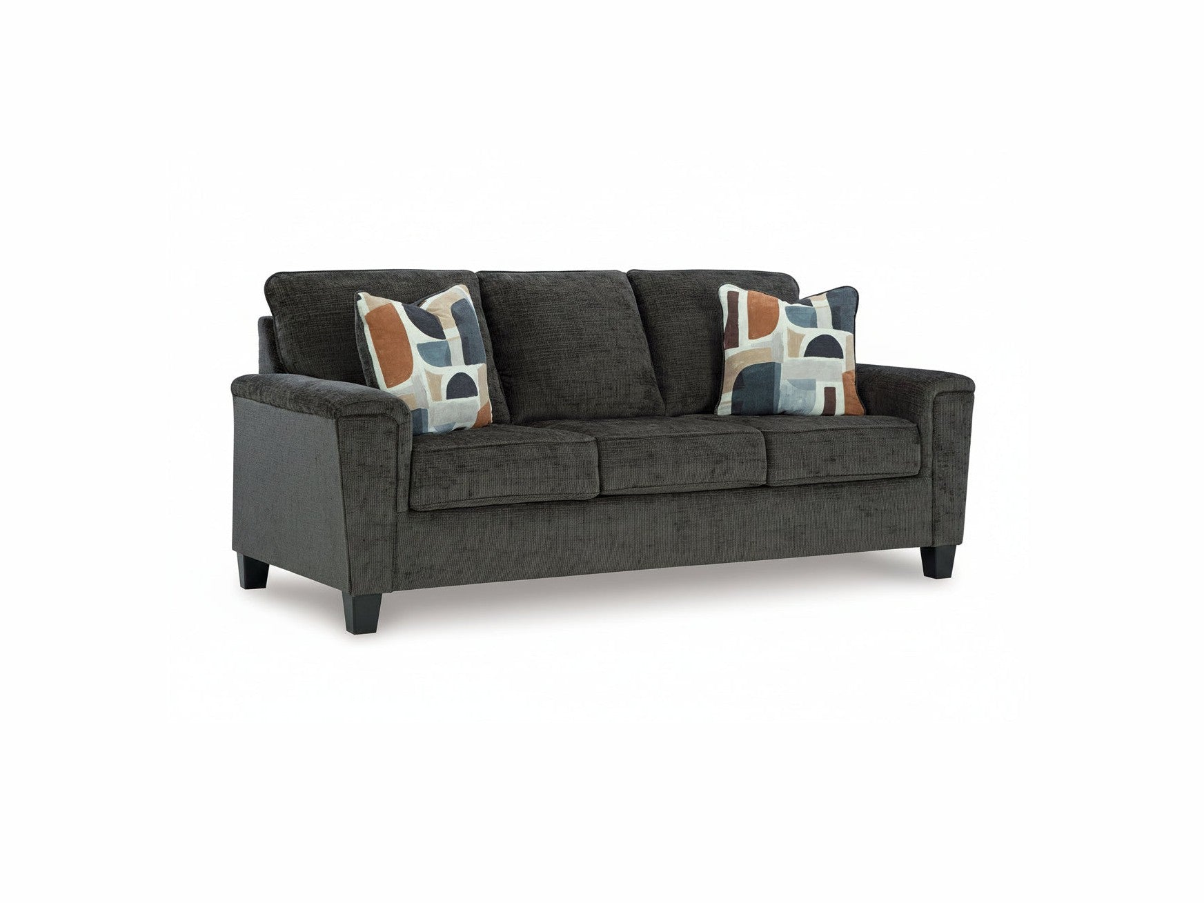 Gray sofa with patterned cushions on a white background