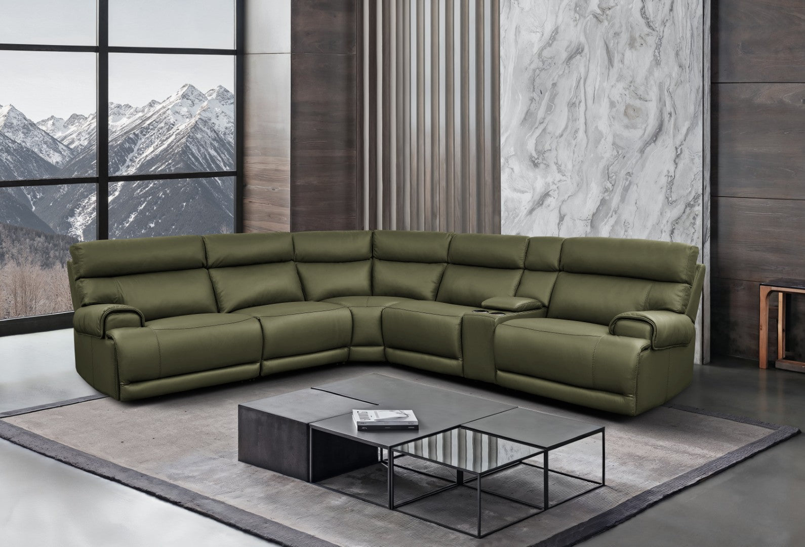 Baron olive green sectional sofa in a modern living room with large windows and a mountain view.