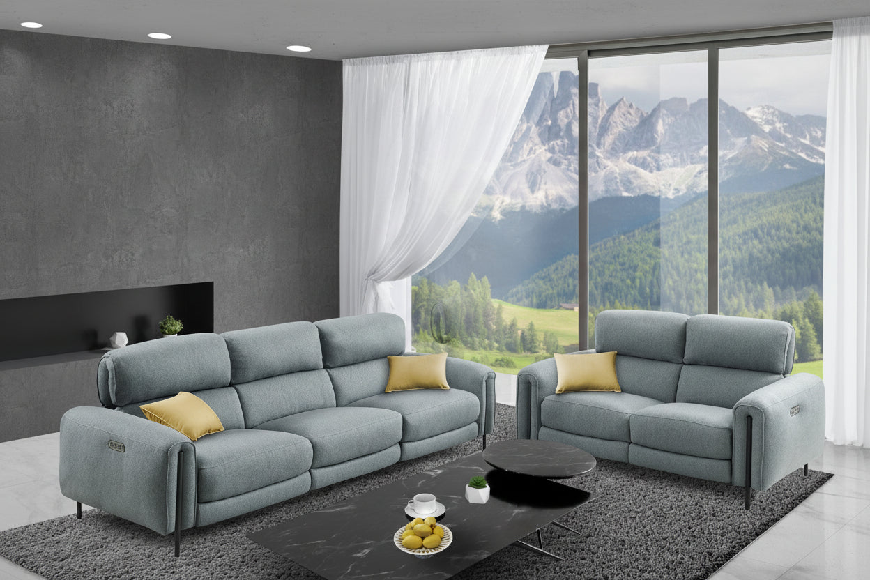 Charm modern living room set with lagoon gray sofas, a coffee table, and a scenic view.