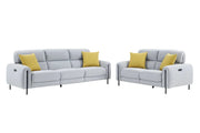 Charm frost sofa set with yellow cushions in a modern living room setting.