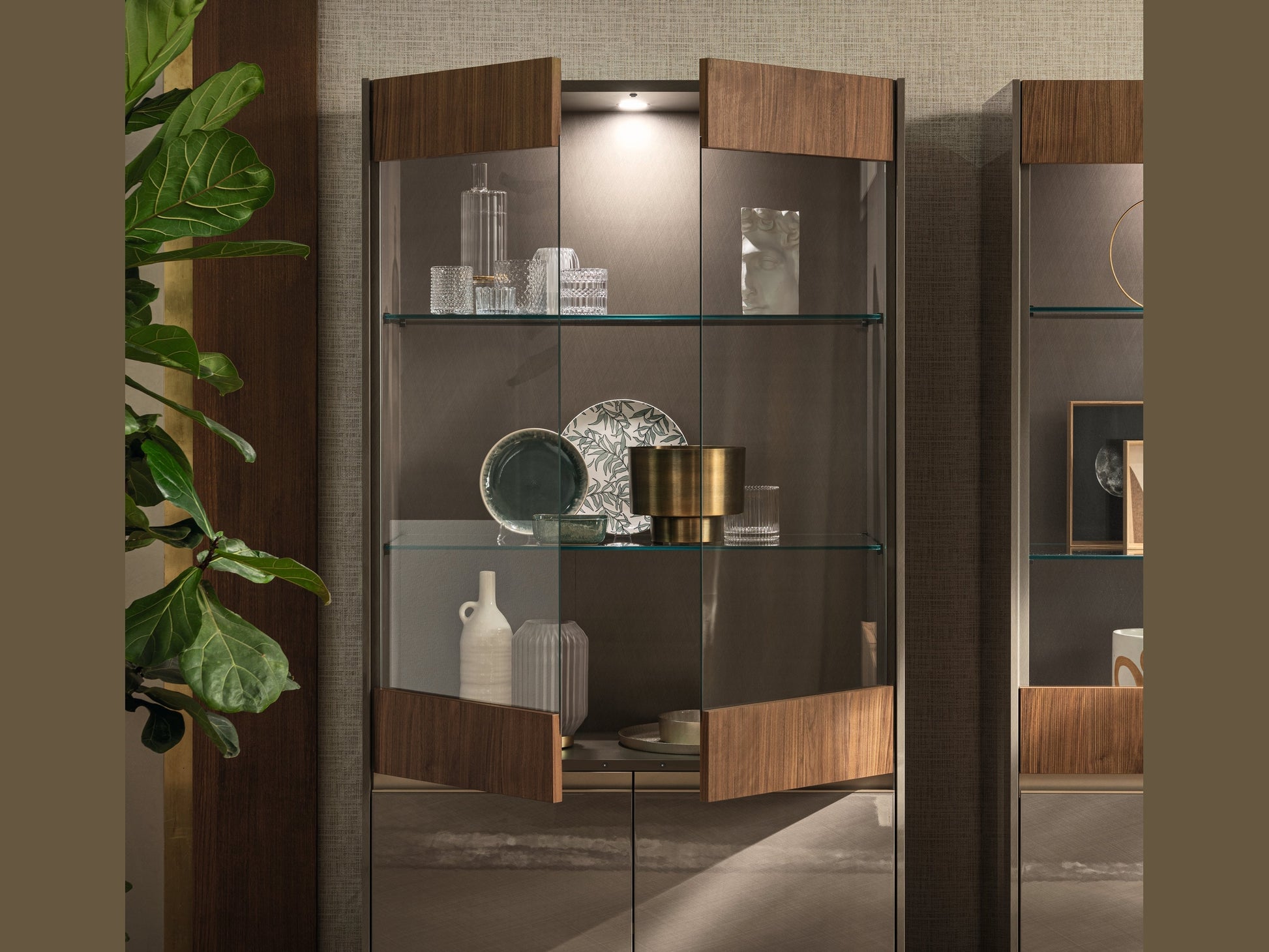Modern display cabinet with decorative items in a room setting