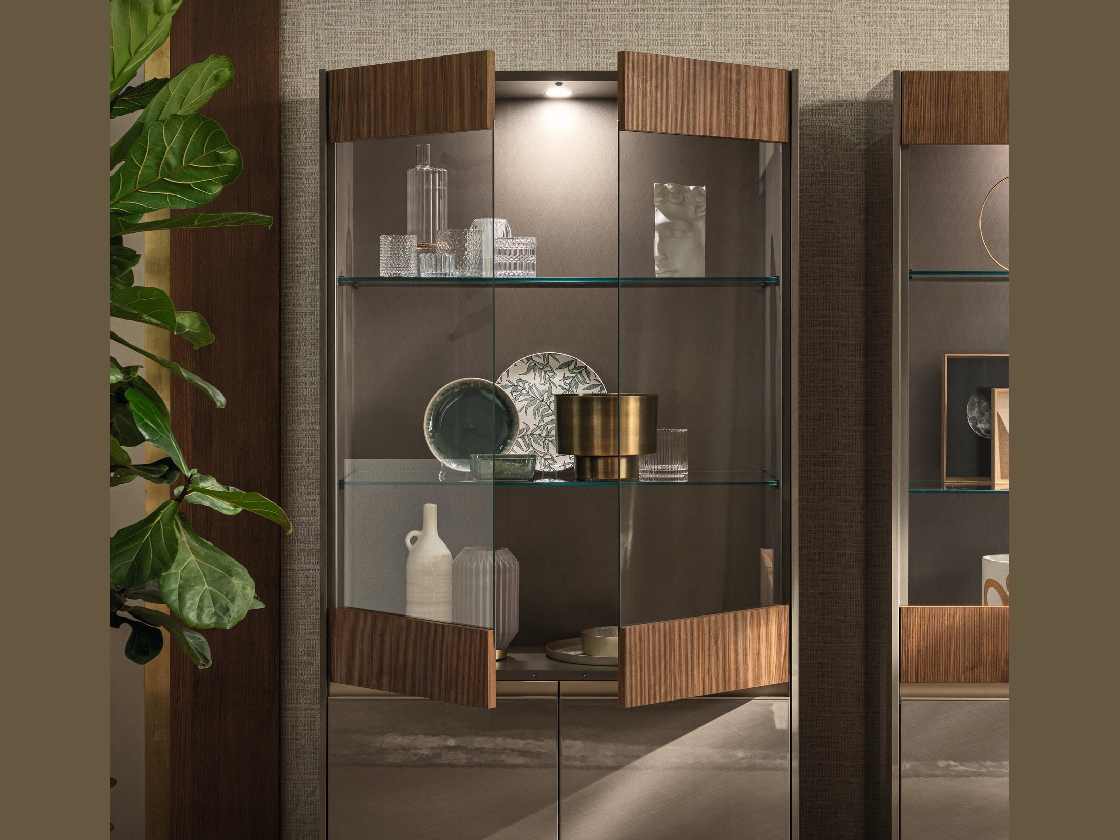 Modern display cabinet with decorative items in a room setting