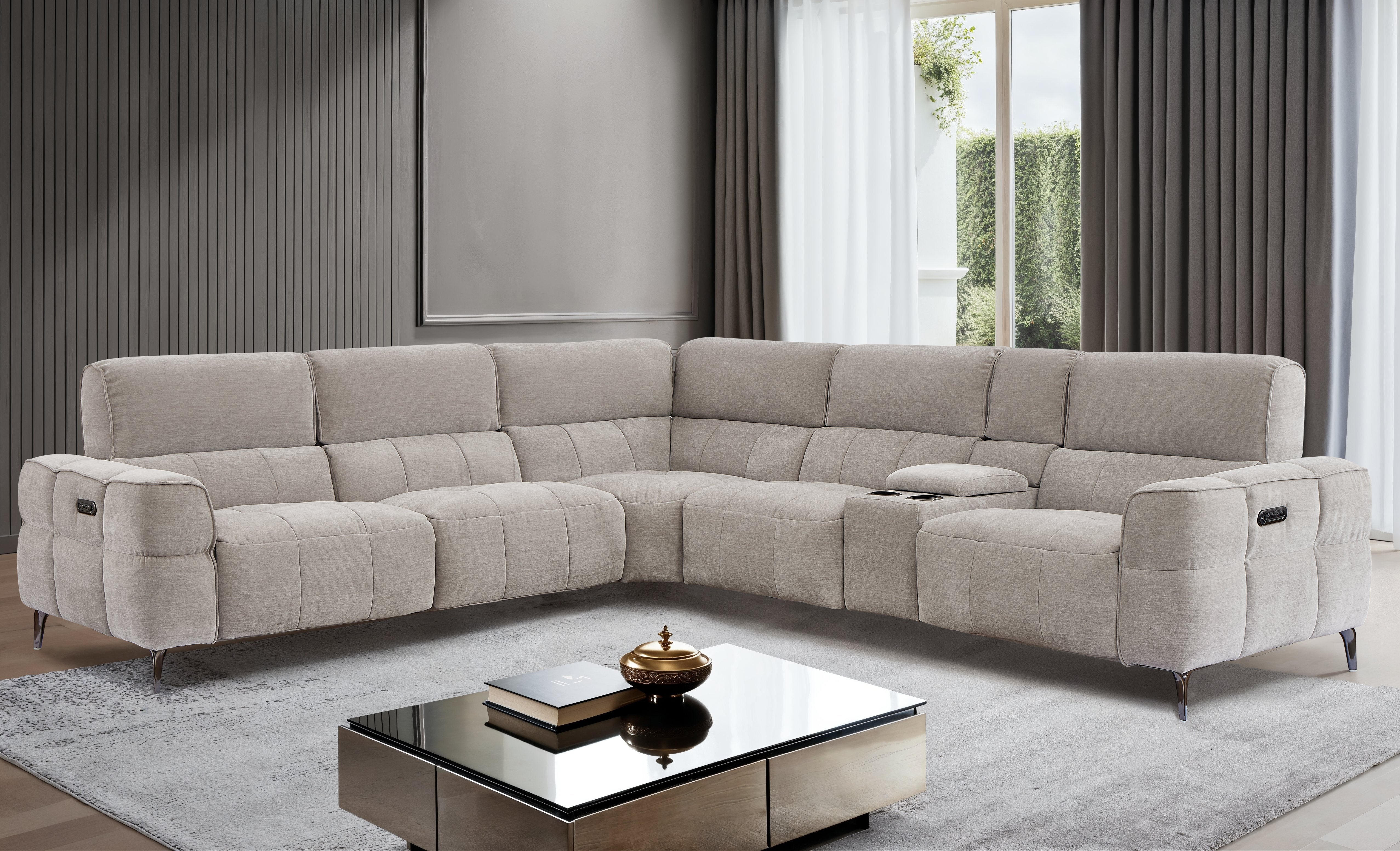 The Cubo sectional sofa in a modern living room with a coffee table and large window.