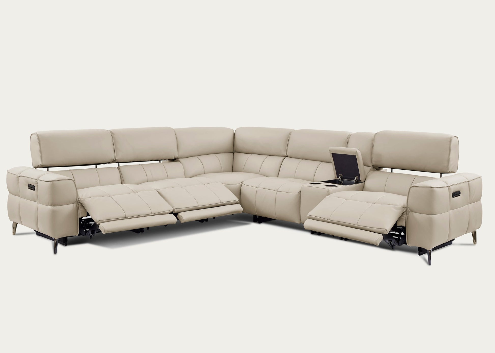 Cubo sectional sofa  in oatmeal leather with reclining features on a white background