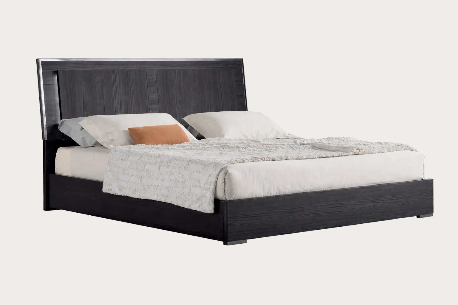 Etna bed with dark wooden frame and white bedding on a white background