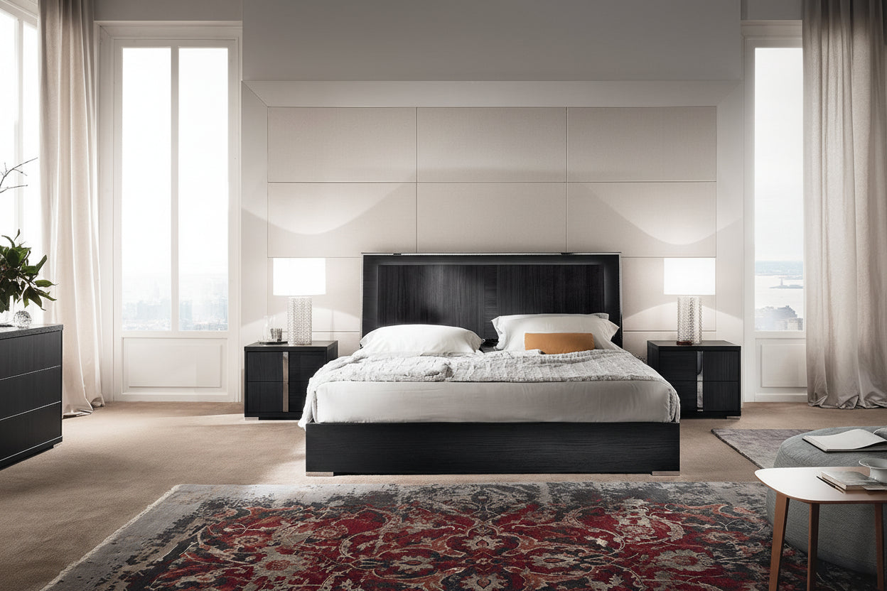 Etna modern bedroom with a bed, nightstands, and decorative rug.