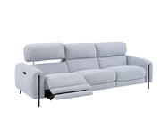 Charm sofa with reclining feature on a gradient background.