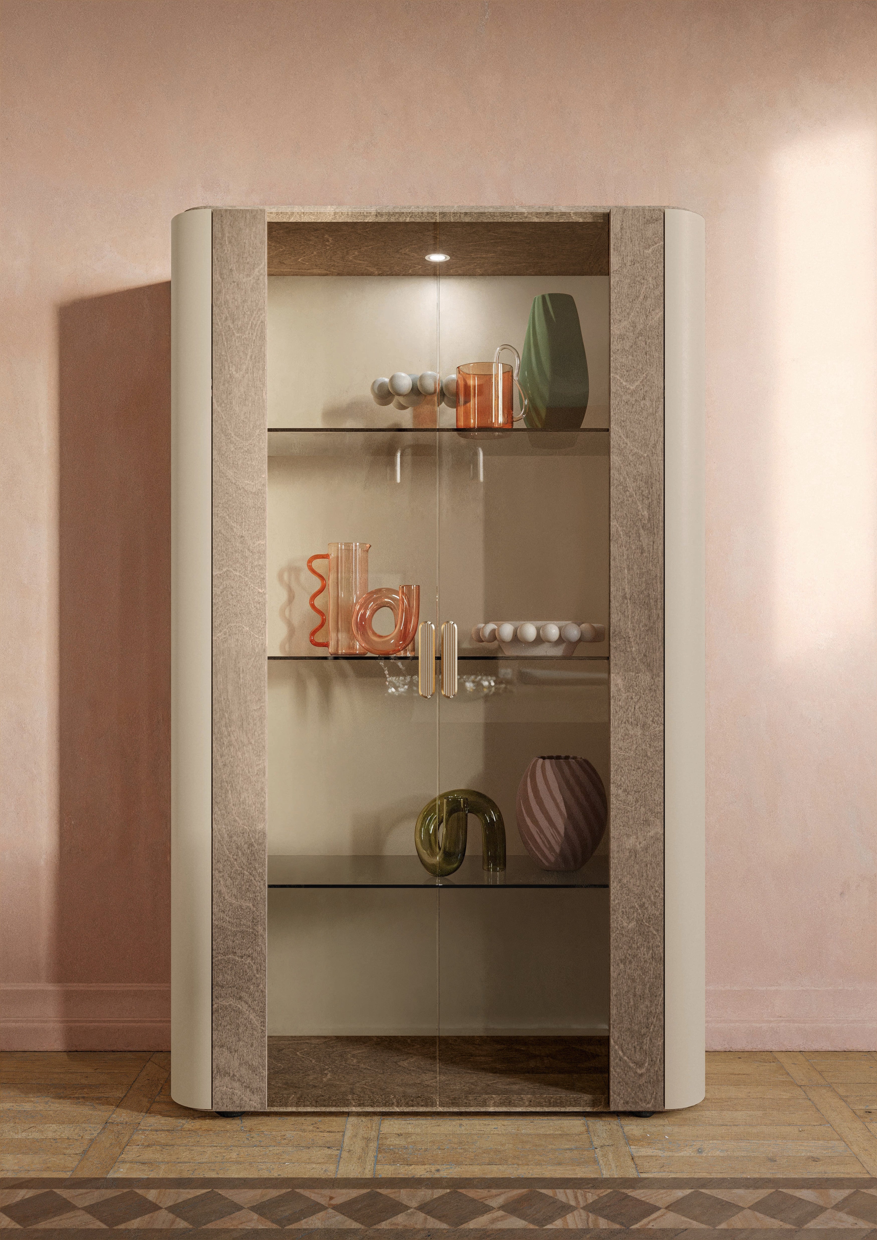 Hebe display cabinet with glass shelves against a pink wall