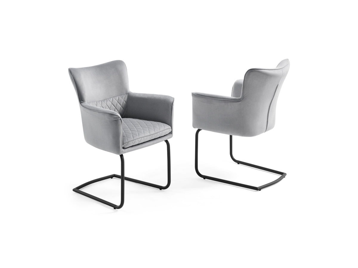 Two Loran gray chairs with quilted armrests on a white background.