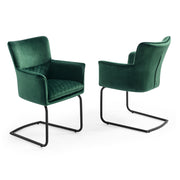 Two Loran green velvet chairs with black metal frames on a white background